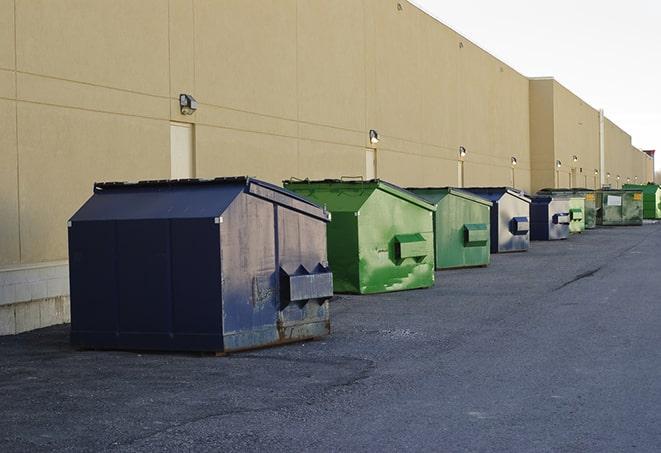 construction dumpsters stacked in a row on a job site in New Berlin